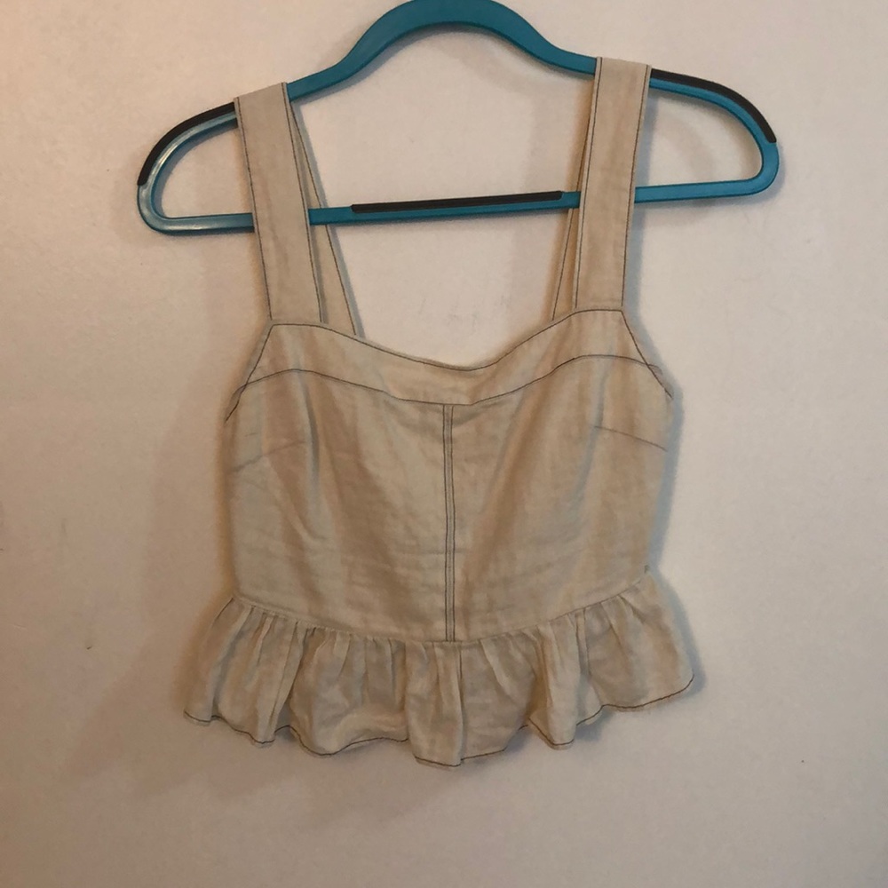 Cream crop top with black stitching